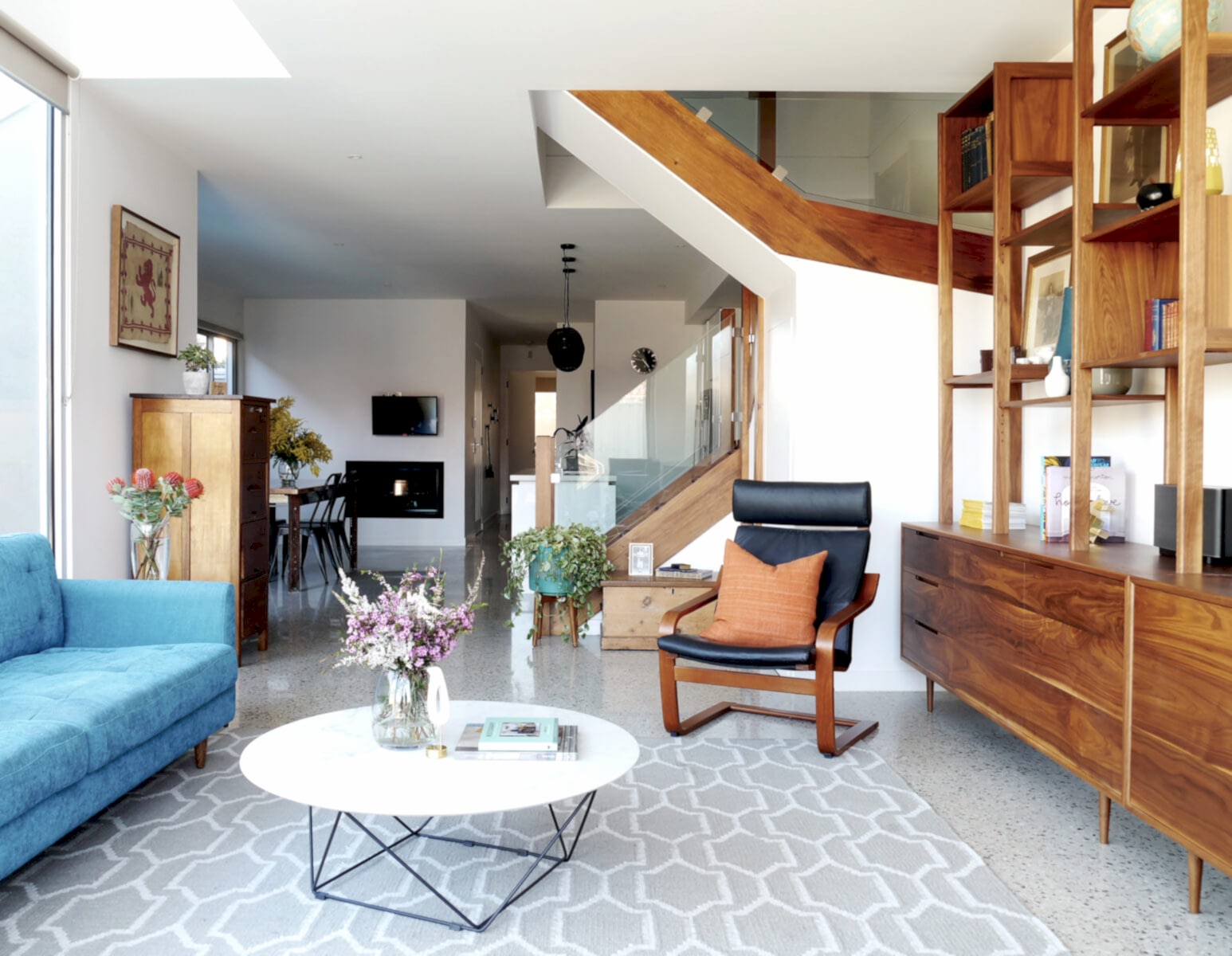 Polished concrete floors with midcentury style furniture
